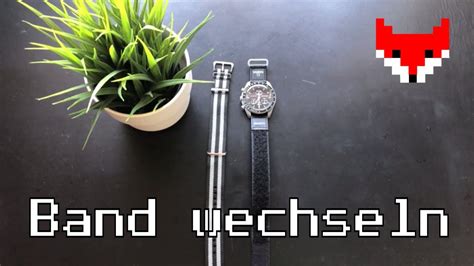 omega swatch band wechseln